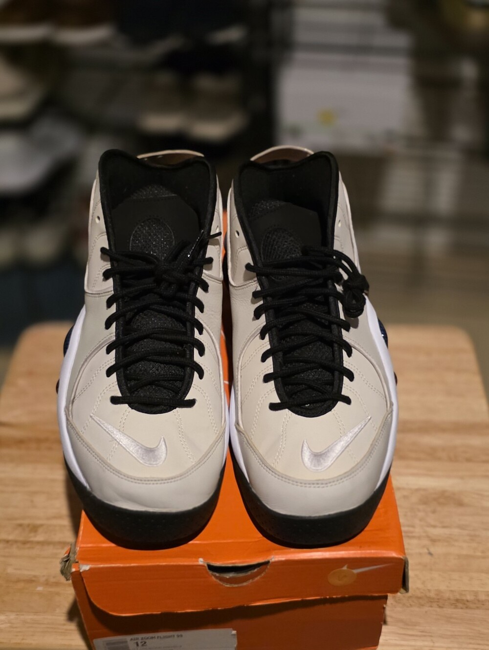 Nike Beige and Black High-Top Sneakers with Silver Swoosh